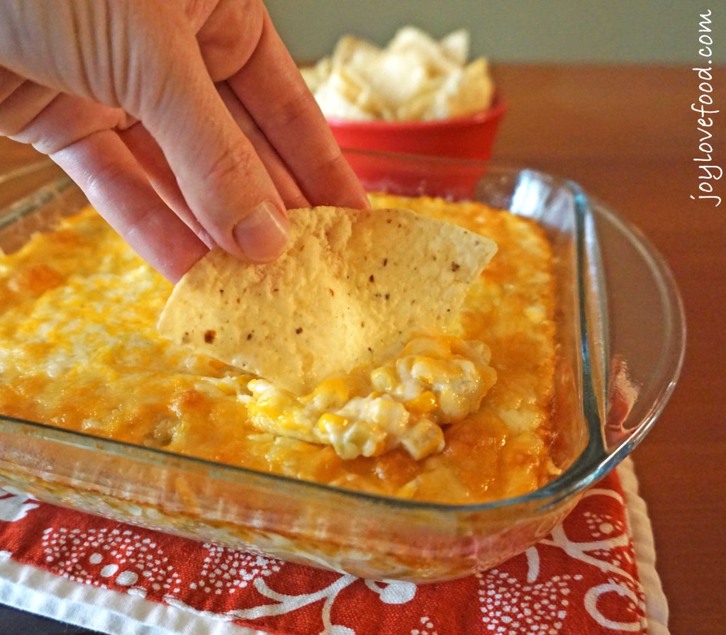 Hot Cheesy Mexican Corn Dip - a delicious, hot dip with corn, green chiles and lots of melted cheese, perfect for sharing with family and friends on a cozy fall afternoon. #NaturallyCheesy #ad